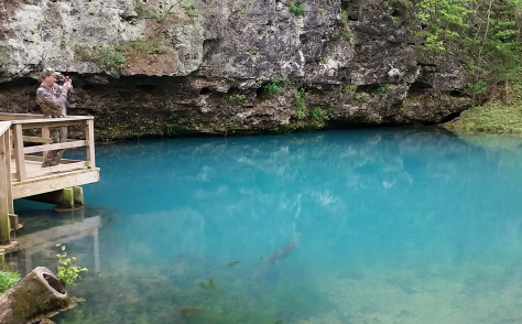 MOC member Jason Jenkins takes in the blue expanse of Big Spring near Van Buren, MO. Photo by Tyler Mahoney.