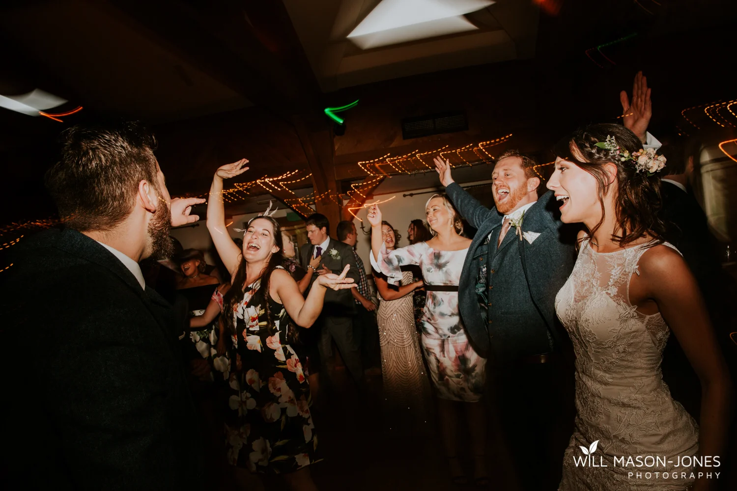  fun colourful and relaxed wedding dancefloor evening photography at king arthur hotel swansea 
