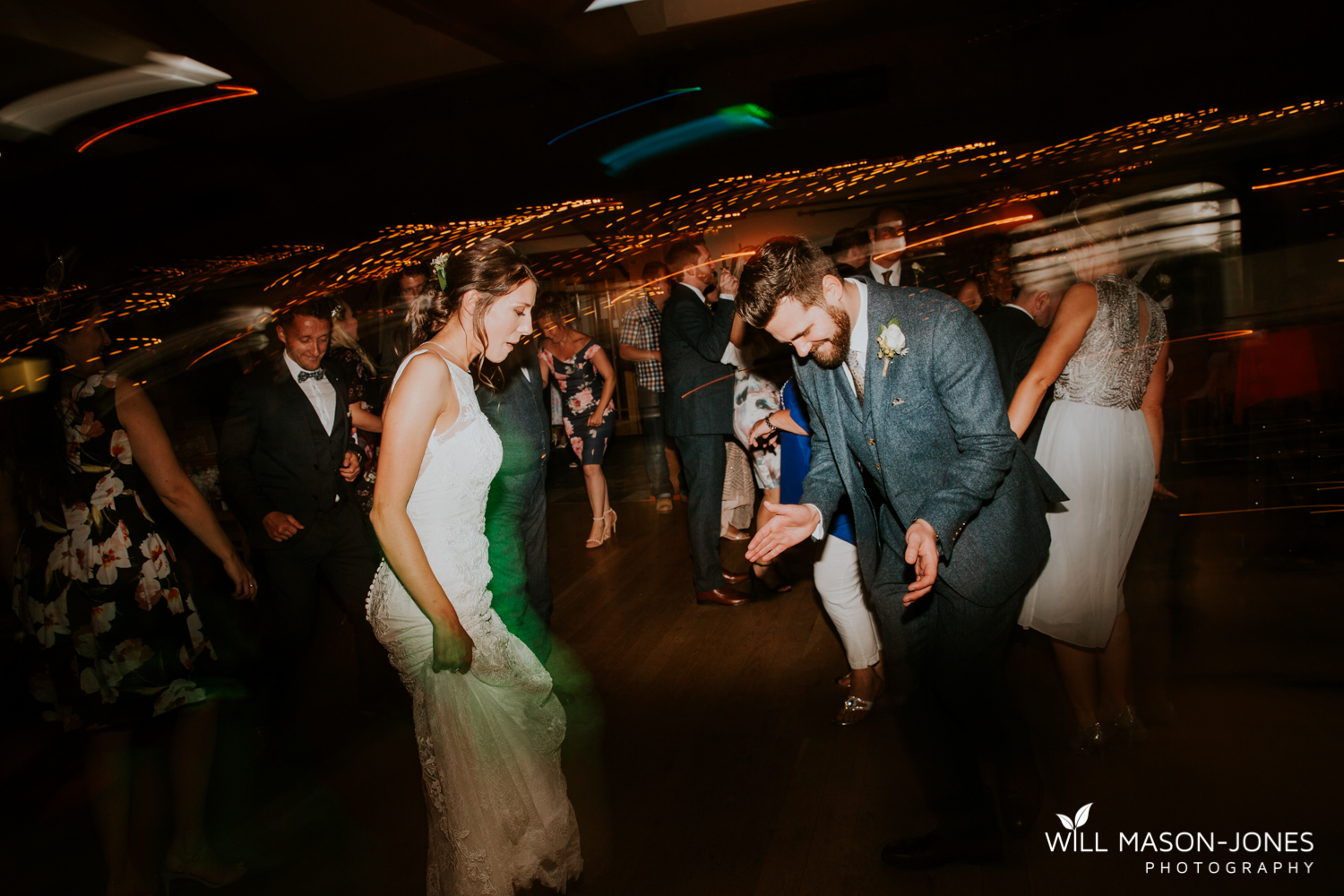  fun colourful and relaxed wedding dancefloor evening photography at king arthur hotel swansea 