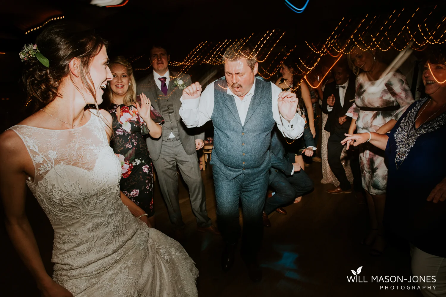  fun colourful and relaxed wedding dancefloor evening photography at king arthur hotel swansea 