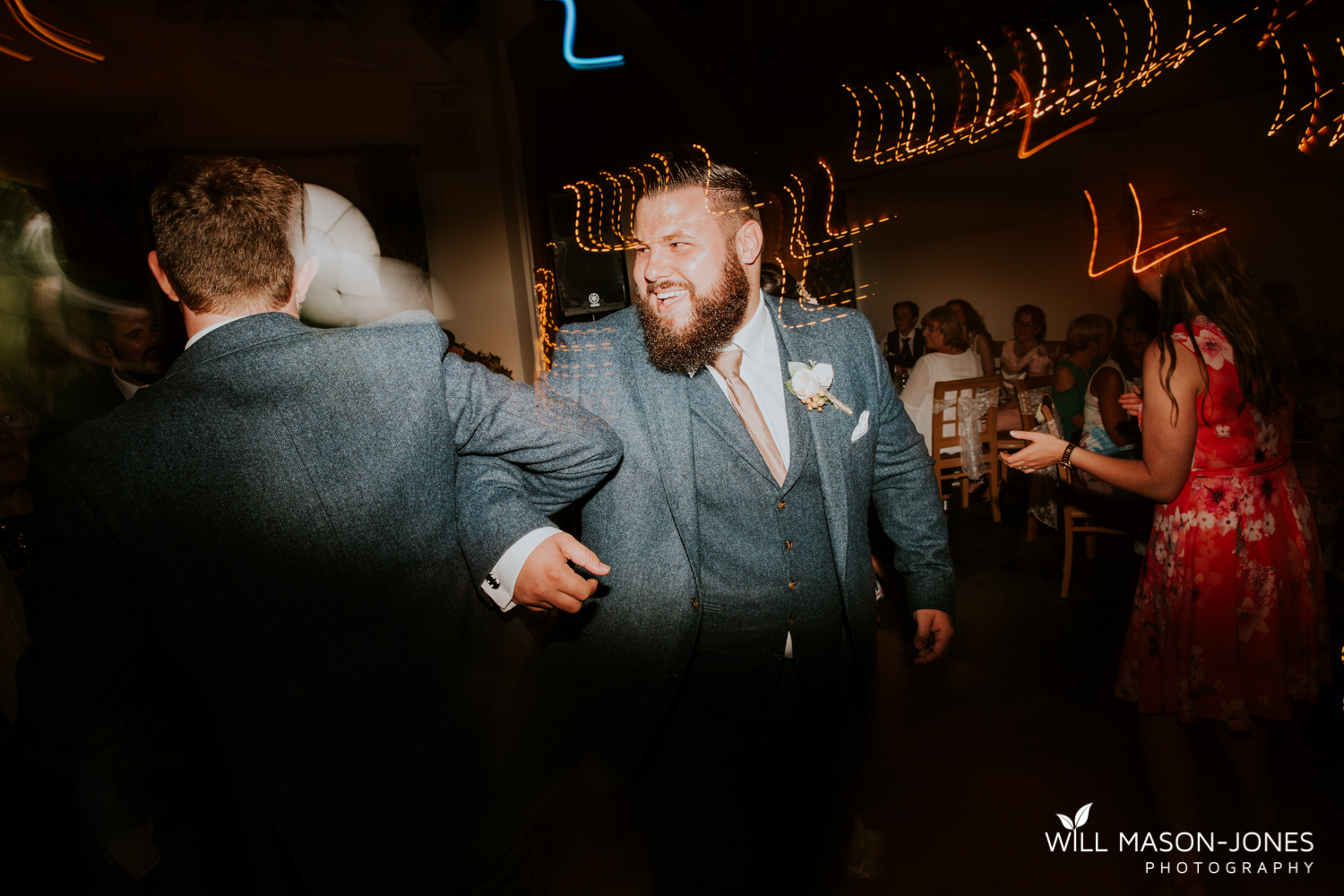  fun colourful and relaxed wedding dancefloor evening photography at king arthur hotel swansea 