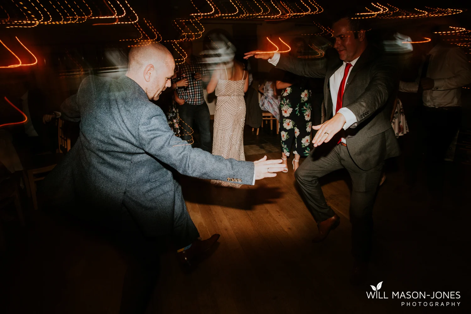  fun colourful and relaxed wedding dancefloor evening photography at king arthur hotel swansea 