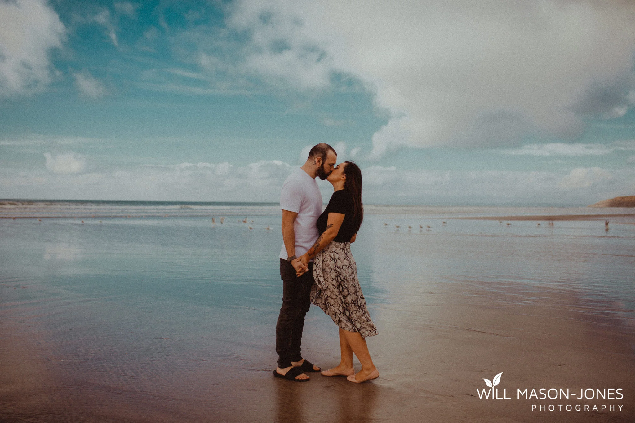 Moody, earthy beach couple session on Llangennith Beach, Gower, Wales