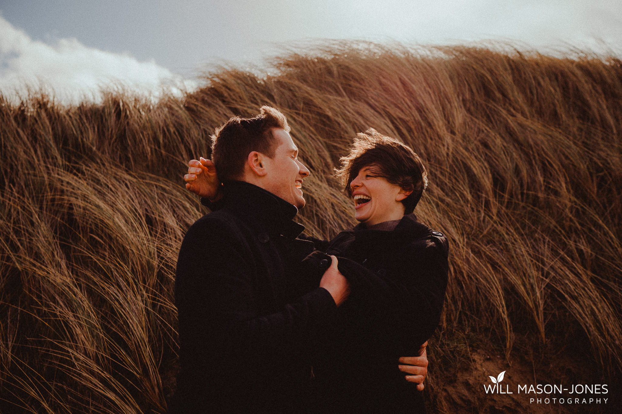 three cliffs bay swansea pre wedding couple photography earthy colourful relaxed photographer