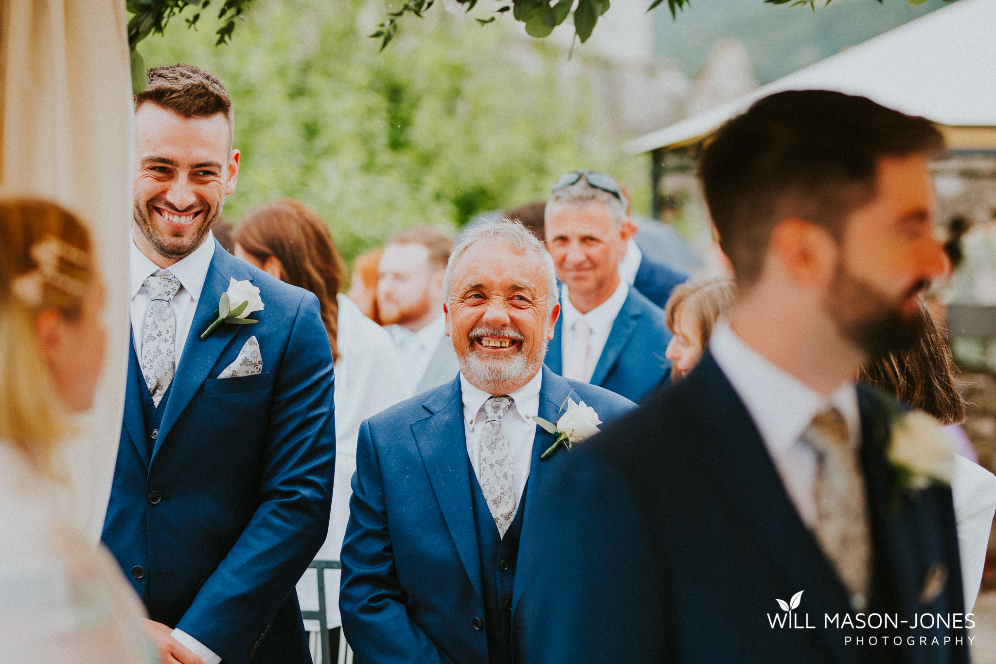  colourful rainy wet outdoor destination wedding ceremony at malcesine castle photography 