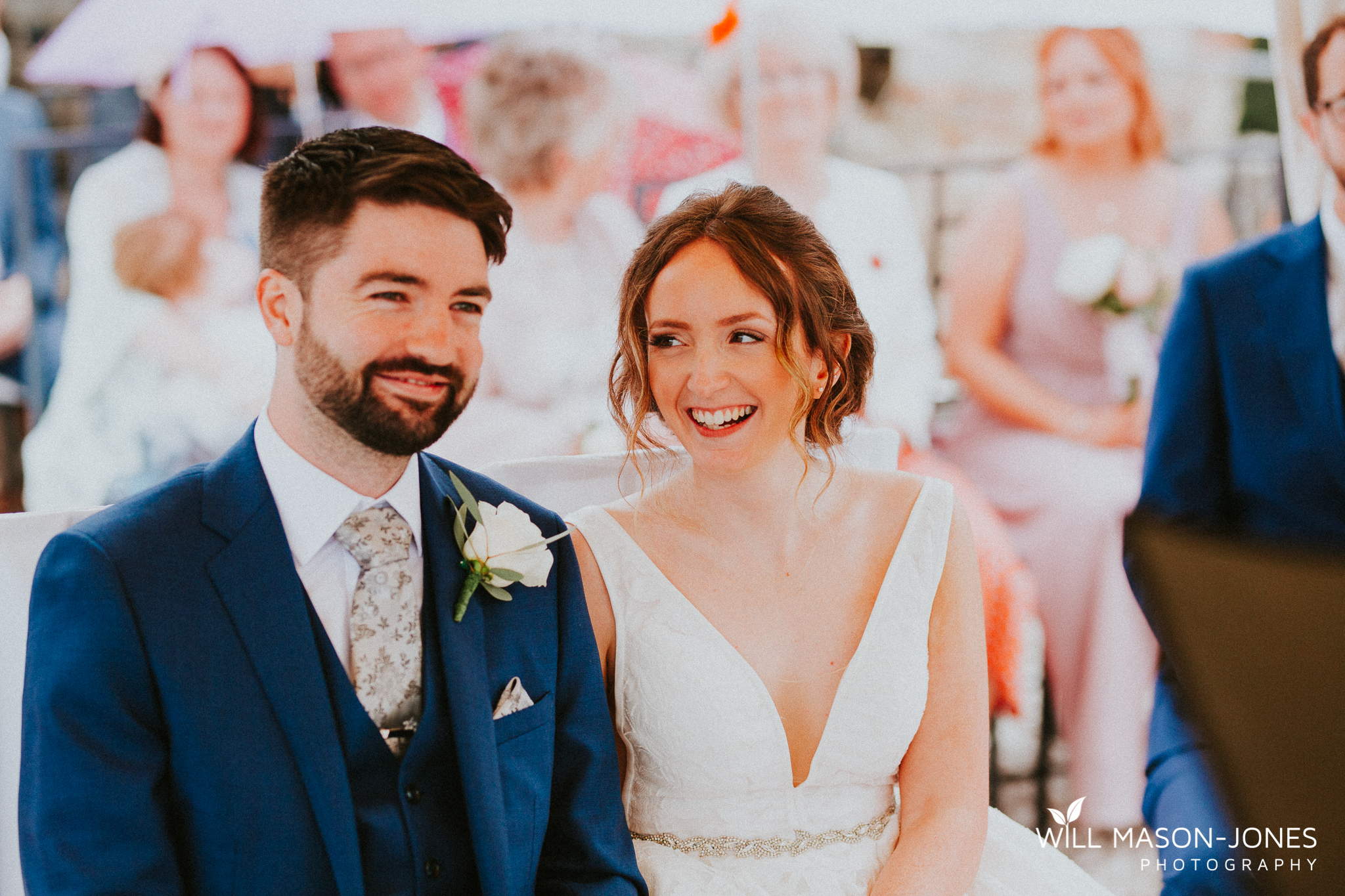  colourful rainy wet outdoor destination wedding ceremony at malcesine castle photography 