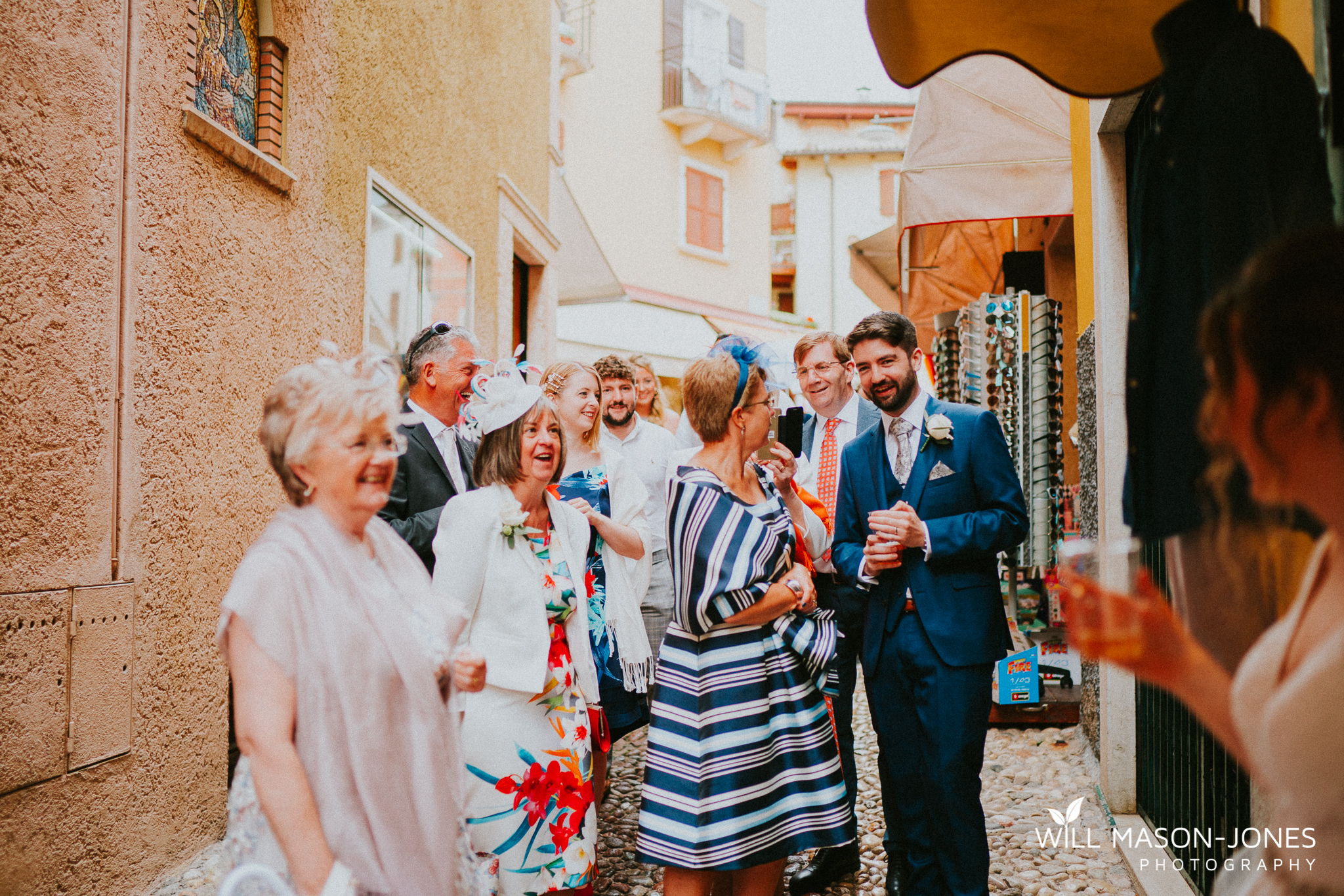  malcesine old town wedding guests candid natural photography lake garda 