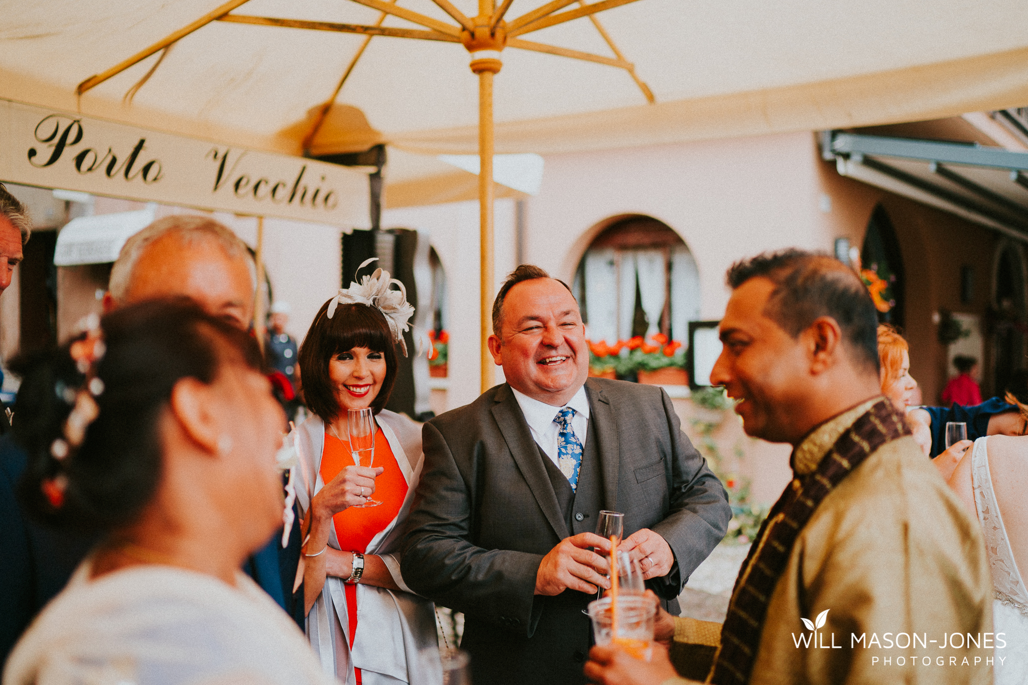  malcesine old town wedding guests candid natural photography lake garda 