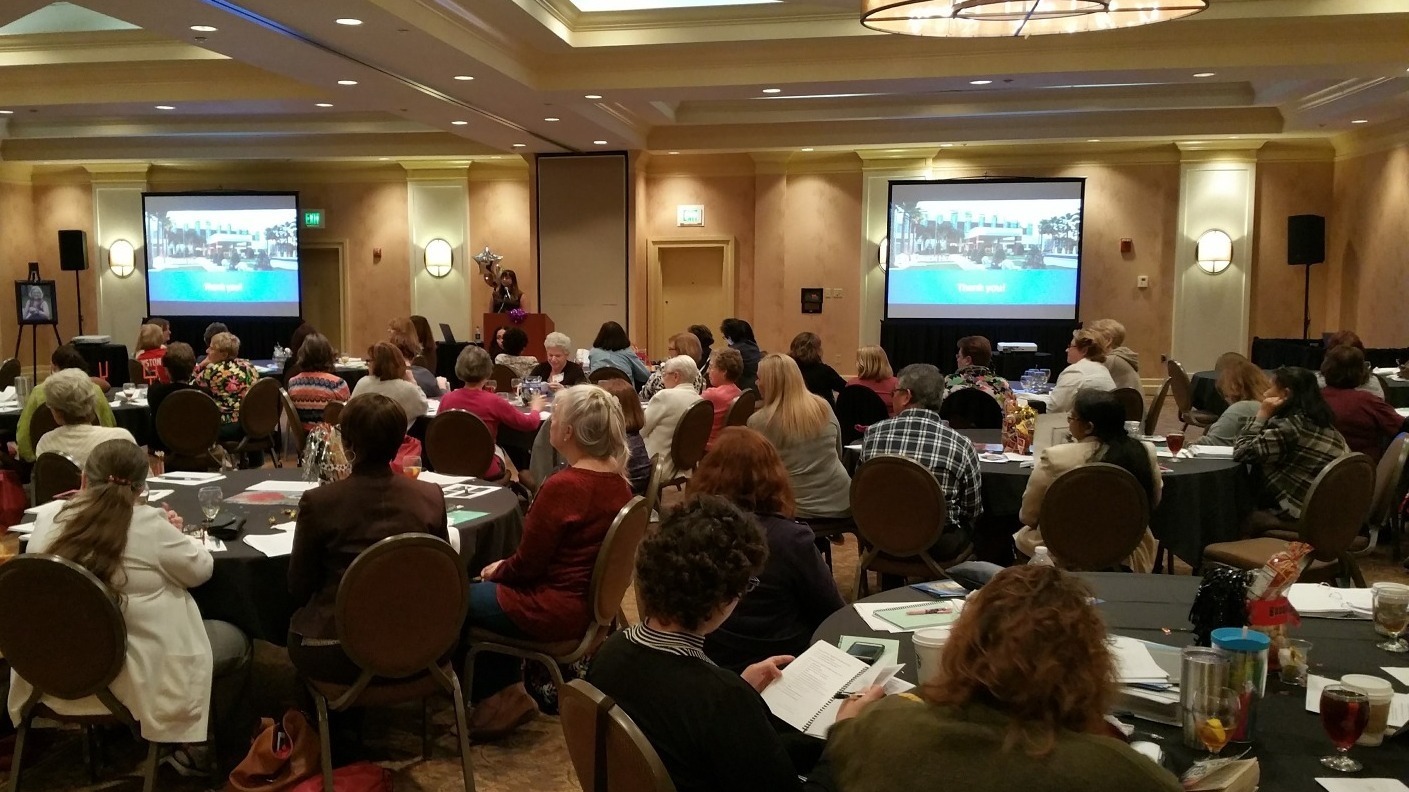 Annual-Conference-in-General-Session-Room-with-Multiple-Screens