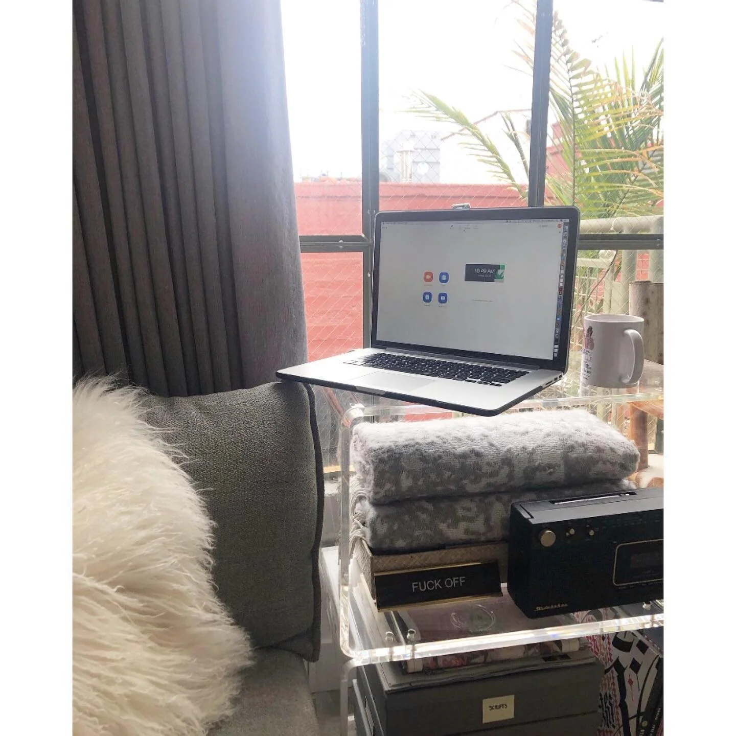 Zoom Meetings on my acrylic cart from @cb2. I LOVE WHEELS.