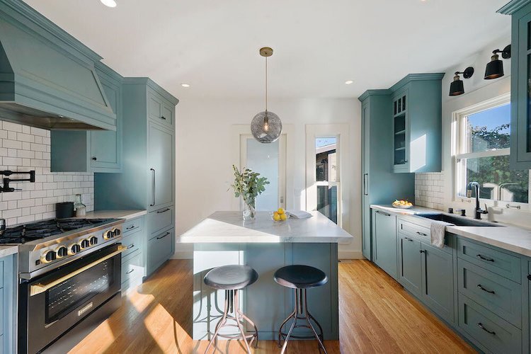 Kitchen+remodel+featuring+Farrow+&+Ball+De+Nimes+Blue+paint+and+gold+accents.jpg