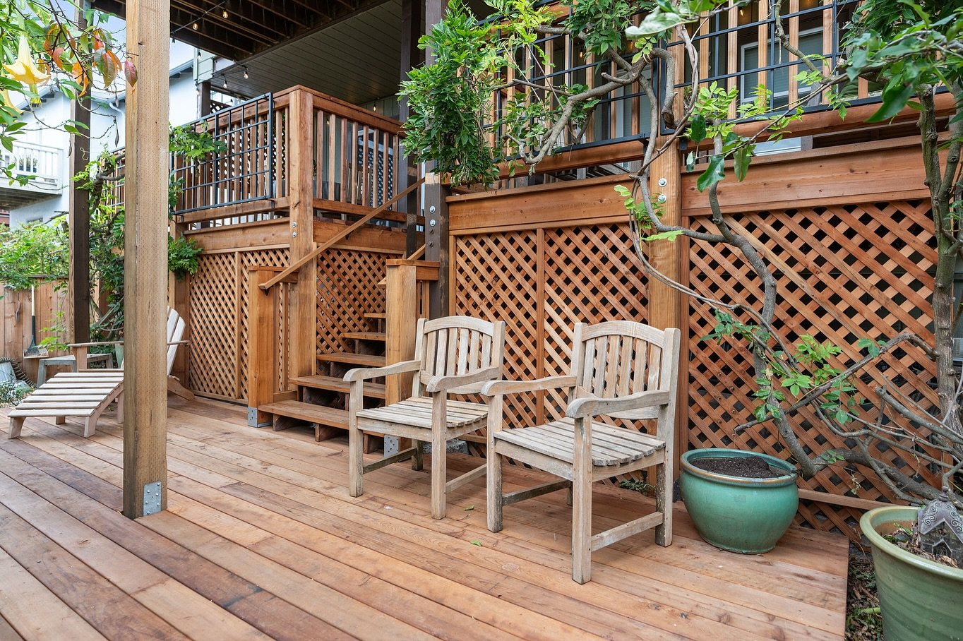 Sun&rsquo;s out, deck&rsquo;s out. ☀️ Summer is made for slow mornings, golden hour hangs, and dinner al fresco. This multi-level beauty was built for all of that and more! Thoughtfully designed with warm wood tones, gorgeous paneling (for looks and 