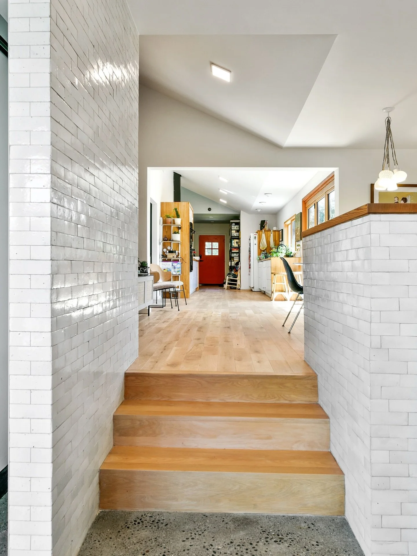 Ideas on how to create a natural separation between spaces? Level changes are a fun way to do so.