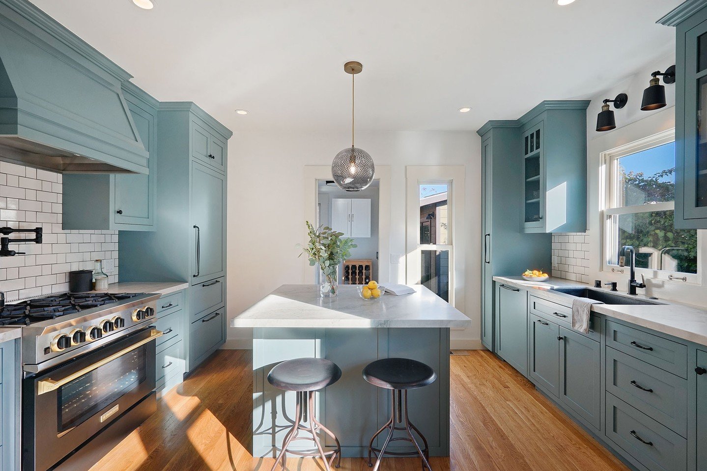 Before ➡️ After�🩵 This 1930s kitchen and dining room were completely reimagined by shifting the kitchen into what was once an adjoining office, creating a brighter, more functional layout.⁠
⁠
Finished with traditional cabinetry in Farrow &amp; Ball 