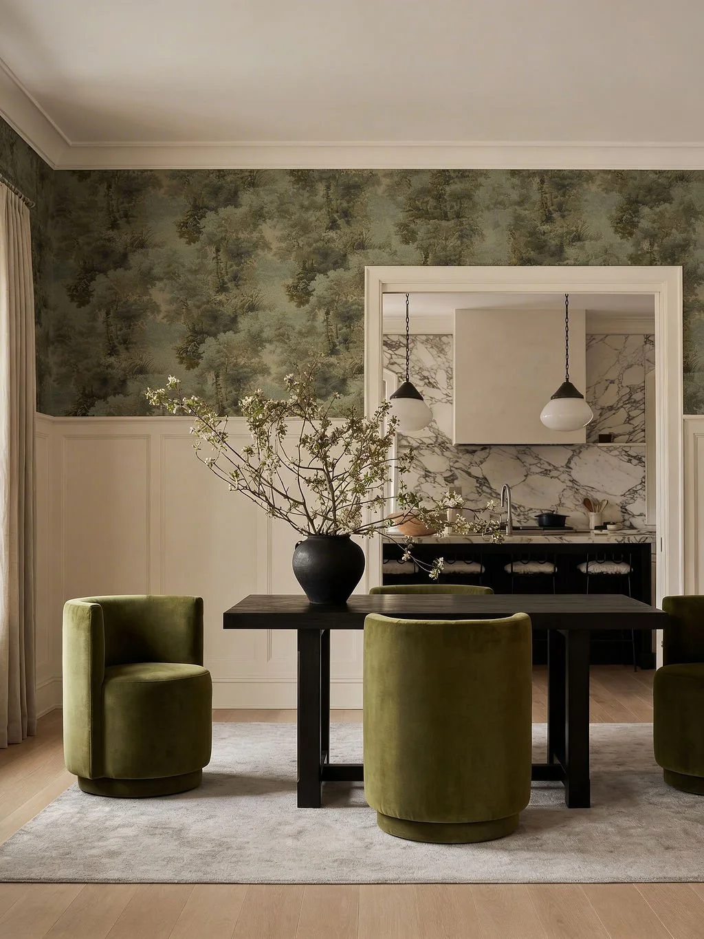 Olive grey fabric dining chairs at a dark wood table.