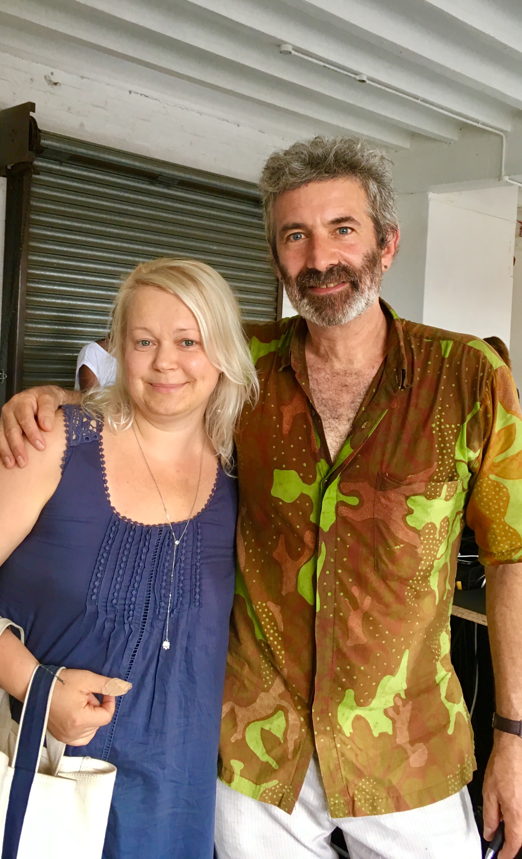 Elena with Sandor Katz Photo ©Evie Saffron Strands Fermenting with Sandor Katz On that meltingly hot Sunday of 18th June I raced through the streets of Hackney to catch up with Sandor Katz. Recognised as one of the world leaders in fermented vegetables, this was someone I had to meet and his Fermentation Seminar, as part of London Gastronomy Seminars , was the perfect opportunity. In a packed and steamy upper floor I learned his perspective on the fermented vegetables I have grown up with and now produce for sale. As Sandor explained, it’s a mere 150 years since science brought us insights into how fermentation works, yet there is evidence that man has been successfully fermenting for at least 10,000 years. Ferments are foods associated with survival as they provide nourishment through the lean months of winter. Sandor pointed out how ‘Pickles’, where the vegetables are effectively sterilised, are often confused with ‘Ferments’. Fermenting, in contrast, actively encourages the healthy bacteria naturally present. Through bacterial transformation toxic compounds are removed, food is preserved, made easier to digest and flavour is added. The health benefits of ferments derive from the activity of pre-digestion where the proteins are broken down into amino acids by lactic acid bacteria (so called because this was first observed in milk). Vegetables are fermented by wild fermentation – no deliberately added bacterias, simply utilising what is naturally present. Sandor pointed out that salt adds flavour but is not essential and length of fermentation is according to preference. Austrians typically expect their Sauerkraut, for example, to be soft. Others prefer more crunch. Most Sauerkraut, he reminded us, is now pasteurised and therefore has none of the beneficial qualities of its wild-fermented original. Food safety was discussed and Sandor re-iterated that the US Department of Agriculture cannot find one example of food poisoning from wild fermented vegetables in the US or in countries they share data with. Science has proved that if fermenting is carried out correctly, bad bacteria like salmonella and e-coli are unable to survive in such an acid environment. I came away from the seminar reassured to find I have a fellow natural fermenter spreading the word on the fascinating world of Ferments. 