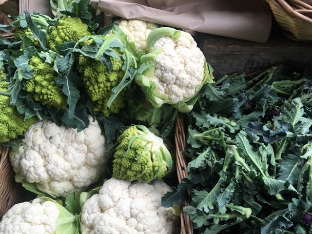 White and Romanesco Cauliflower (and Sprouting Broccoli on the right) Photo ©Evie Saffron Strands