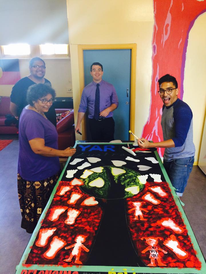 2016 January 20th Our Team painting with Aunty Kathryn preparing the Murals for our YARN Story Telling Workshop at YABUN FESTIVAL. Above: Aunty Kathryn Dodd Farawell, Warren Roberts YARN Founder, Patrick Gallego YARN Research Director, Chris Rodrigo YARN Volunteers Coordinator.