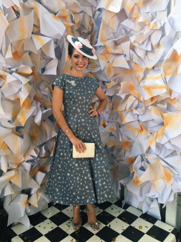Gorgeous Bella in her amazing classic twist dress making the Finals of Fashions on the Field Complemented by Sonlia Millinery