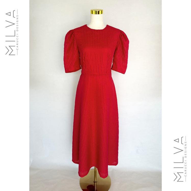 Latest Release 
Ready to Wear 

'Ruby' 
This stunning dress is designed to shine not only during the festive season but will also make a statement every time you wear it.

Crafted from a lightweight brocade fabric with a sheer, woven texture, it is f