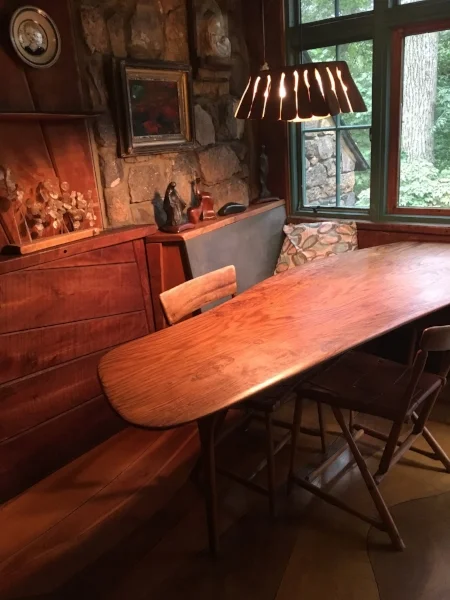 Dining area including light fixture and floors also created by Wharton Esherick