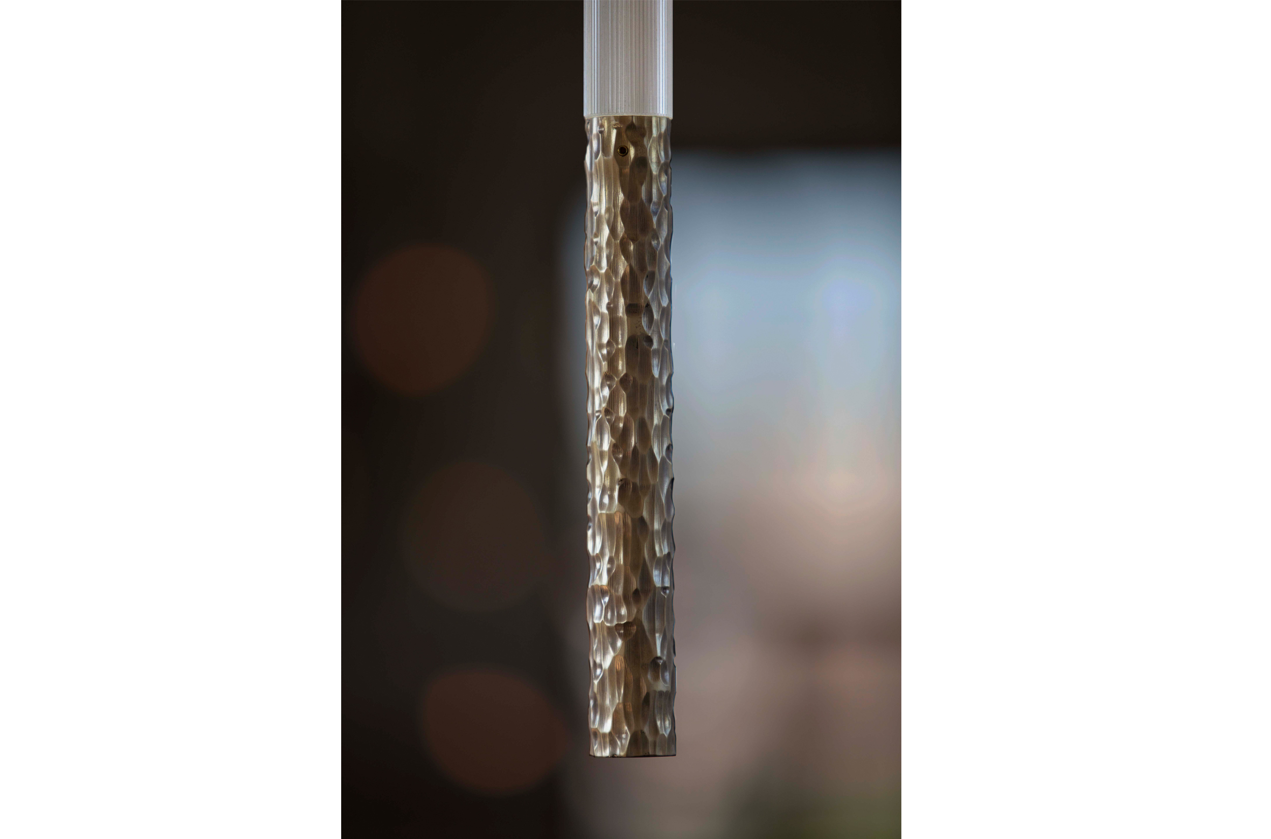 Amuneal carved light web orient 2.jpg