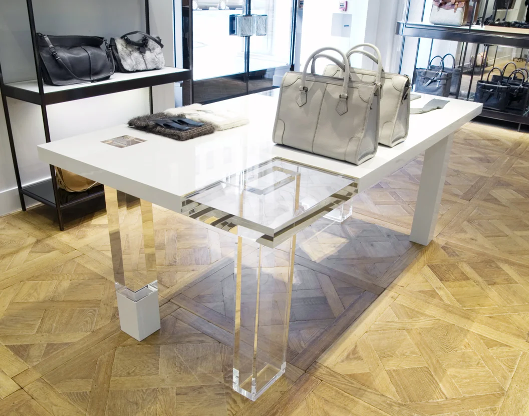 Reed Krakoff table with clear leg.jpg