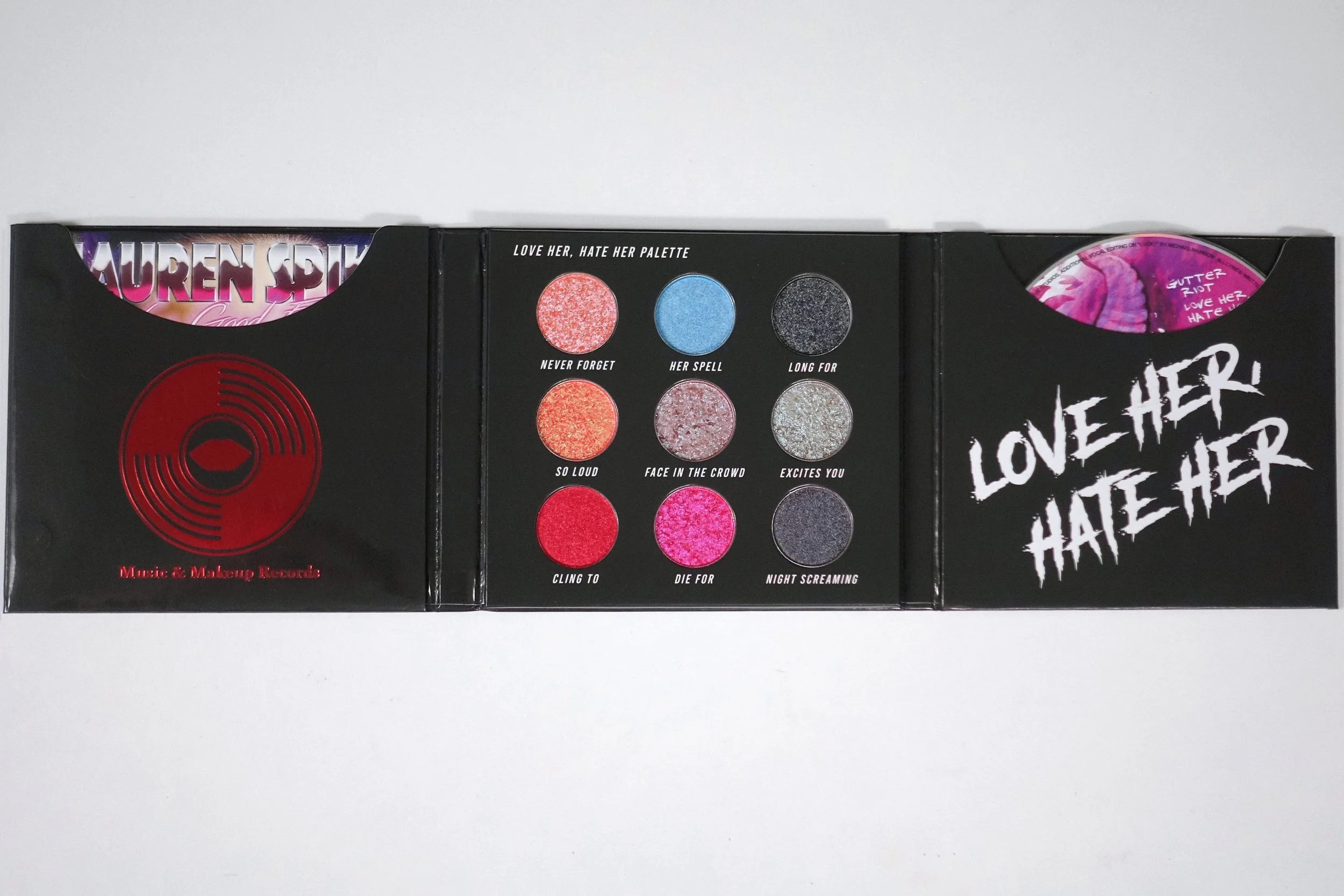 Love, Her Hate, Her Eyeshadow Palette. Eyeshadow colours  Shimmer Blush/ Peach/Mauve, Baby Blue, Glitter Black,  Gun Metal, Metallic Red/Magenta/Dark Purple.