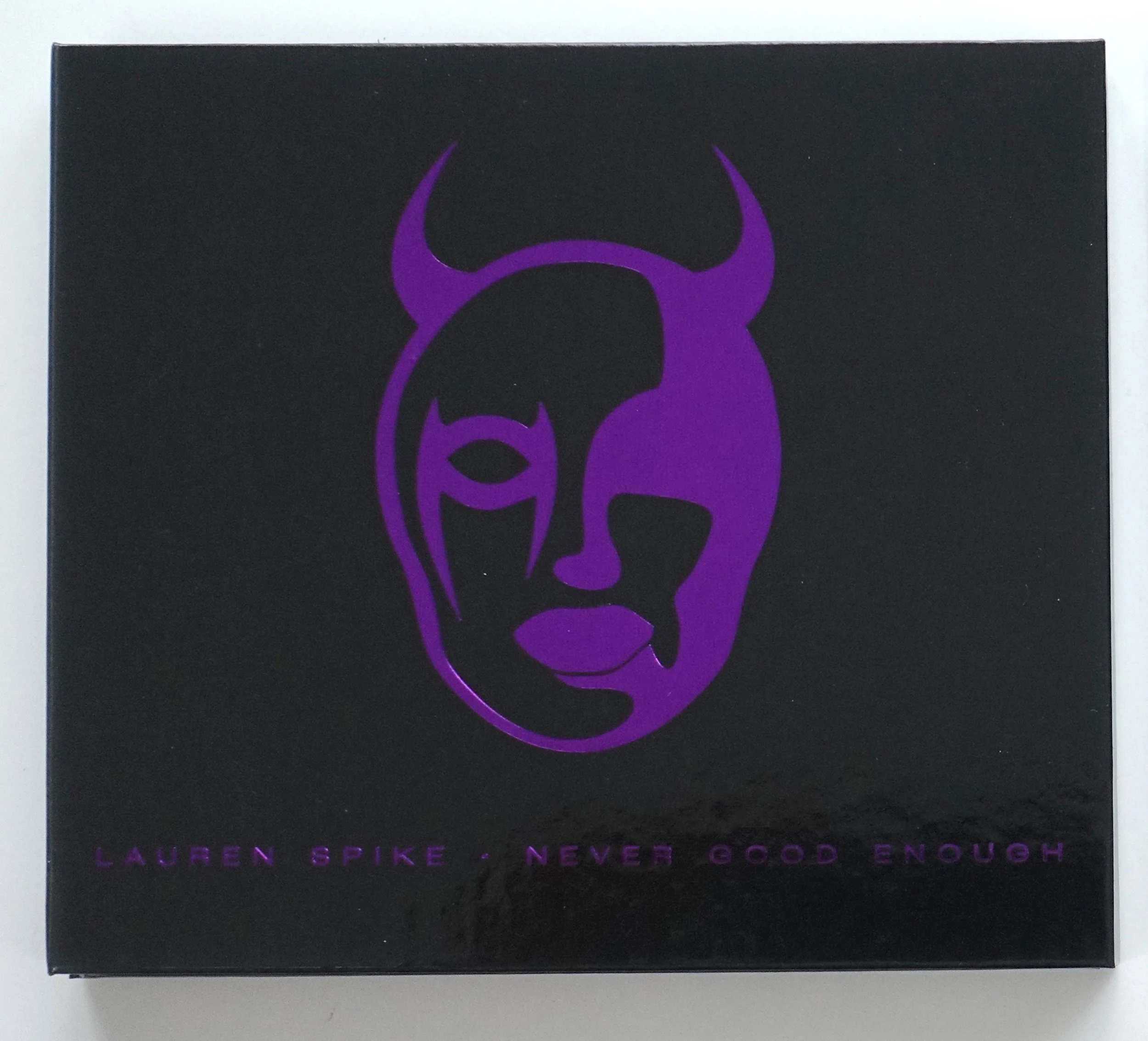 Gutter Riot CD cover with Metallic Purple Devil Girl Logo