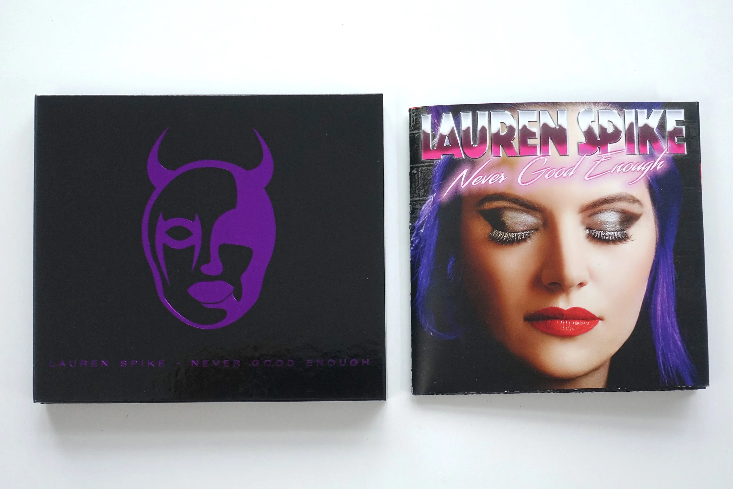 Gutter Riot Eyeshadow Palette with Never Good Enough music album by Lauren Spike. CD booklet