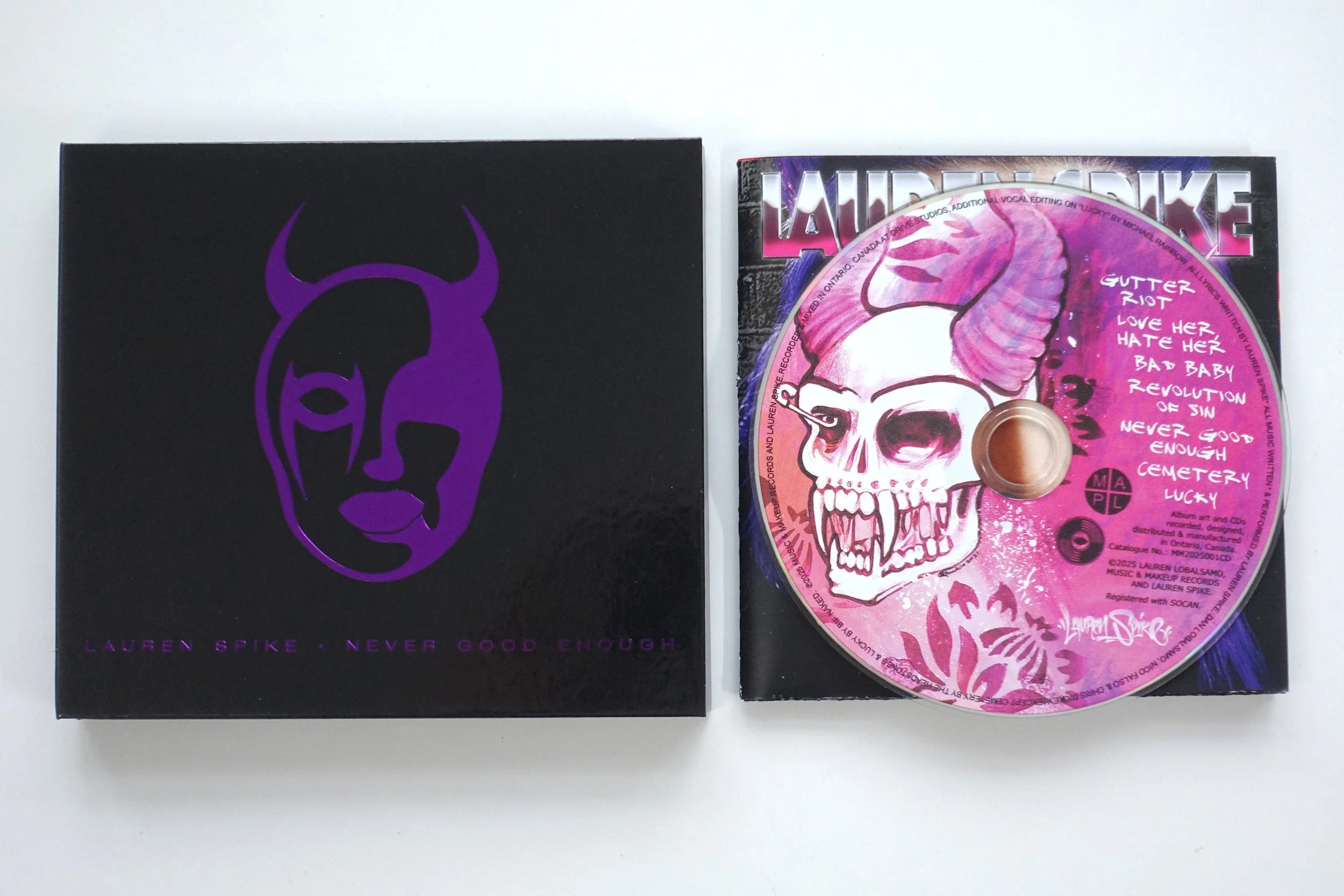 Gutter Riot CD cover with Metallic Purple Devil Girl Logo and CD
