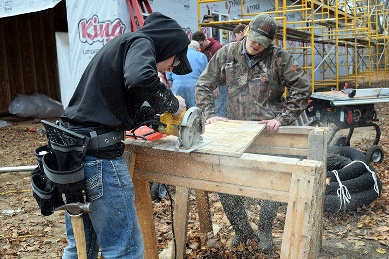 The project offers students the chance to learn many aspects of home construction, including framing, electrical and drywalling.