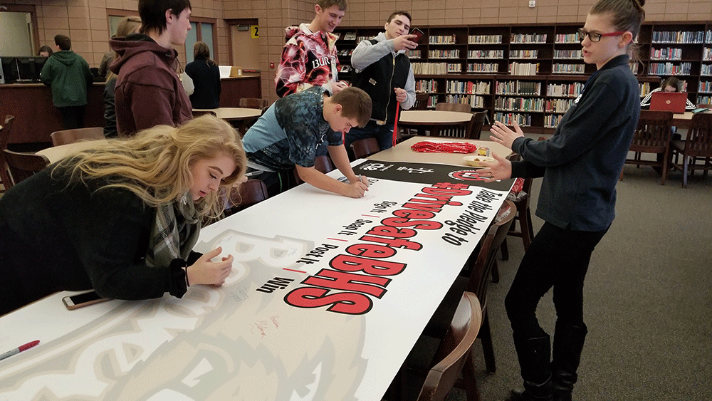 Students at Beaverton High School take the #DriveSafe pledge on Feb. 11, adding their names to those of students from high schools in Farwell, Harrison, Gladwin and Clare.