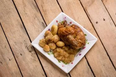 Grilled chicken plate, photo courtesy of Tomorrowland