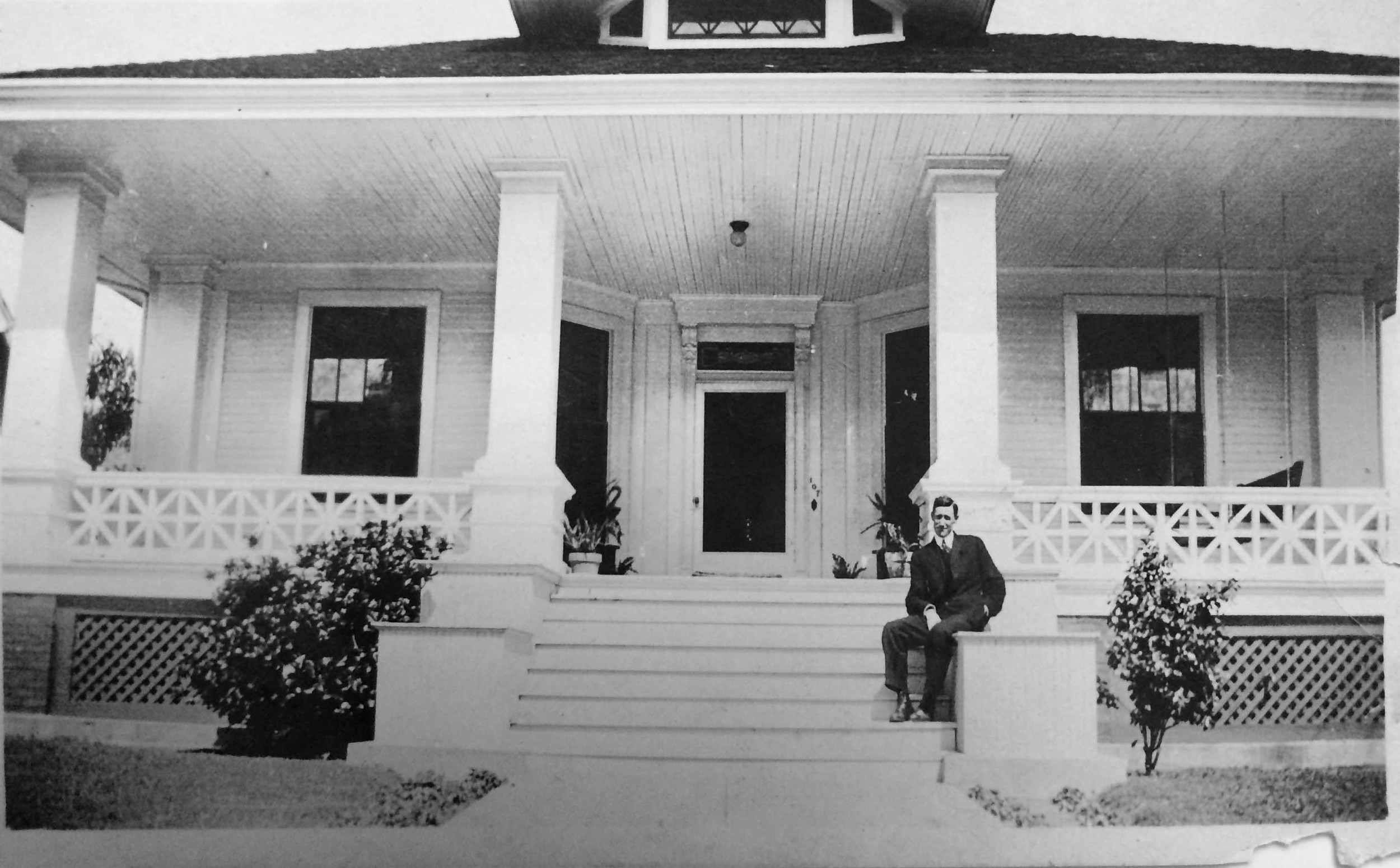 Mrs. Myrt's father in front of the home, pre-1940.