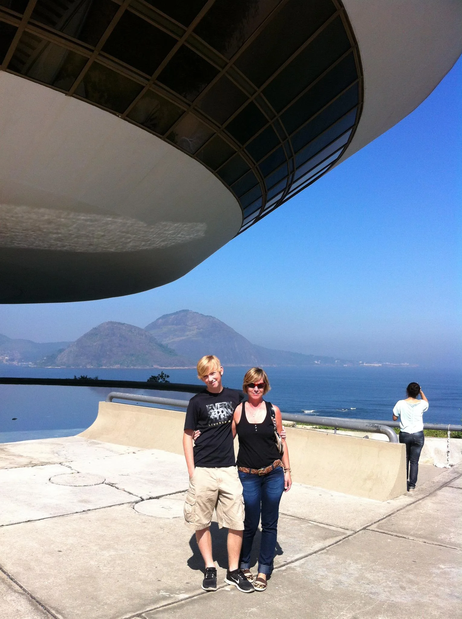 My son and I at the Museum of Contemporary Art MAC in Niteroi, Brazil designed by the famous Brazilian architect Oscar Niemeyer .