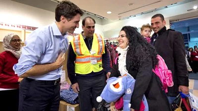 Justin w refugees.jpg
