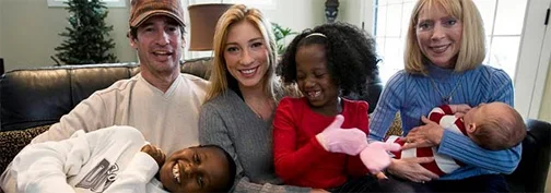 Charlie Keepman (l) withYtbarek, 8; Richelle KeepmanwithArsema, 6; and Scotti Keepmanwith grandson Harrison Keepmanat their home in Oconomowoc, Wis. (AP Photo/Milwaukee Journal-Sentinel, Tom Lynn)