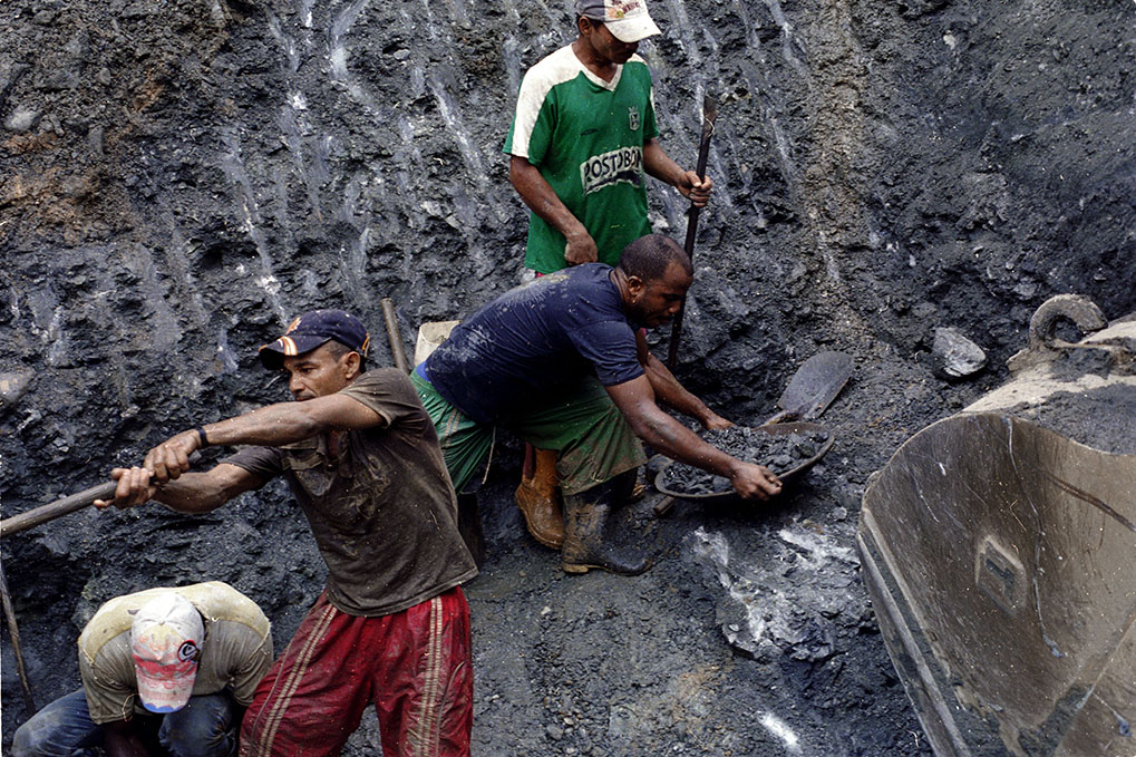  At a gold mine on the outskirts of Zaragoza, Antioquia, Colombia, in the region known as La Puercera, approximately 150 freelance gold miners pan for gold in a pit dug by the company which operates this gold mine. 