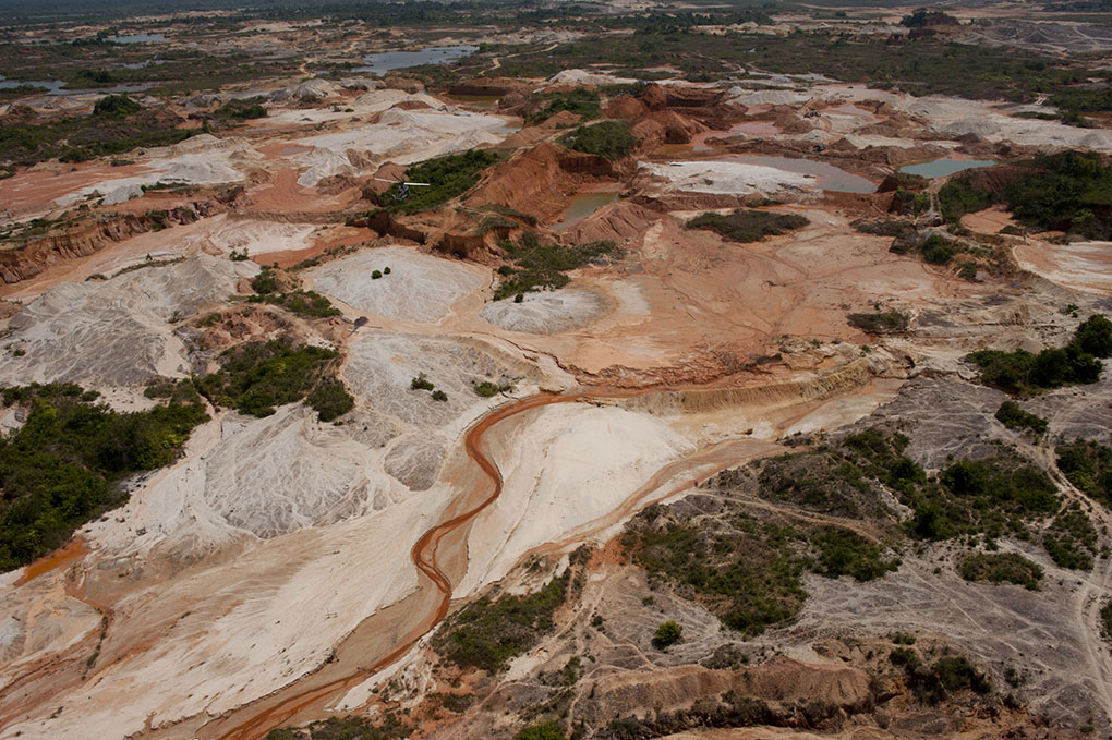  View of gold mining zone in northern Antioquia department, as seen from police helicopter.  Many miners use mercury, a harmful neurotoxin, to separate gold particles from the surrounding soil, both in river-based and underground mining. The run-off 