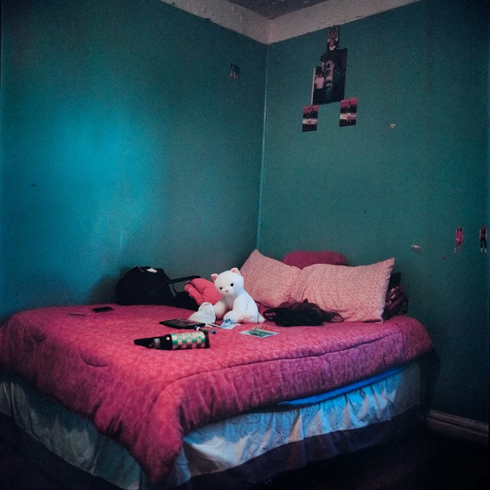 Delia painted her room in blue. “It was my favorite color sometime ago, now I want to paint it pink.” © Ruth Prieto Arenas, 2013 MF Fellow.
