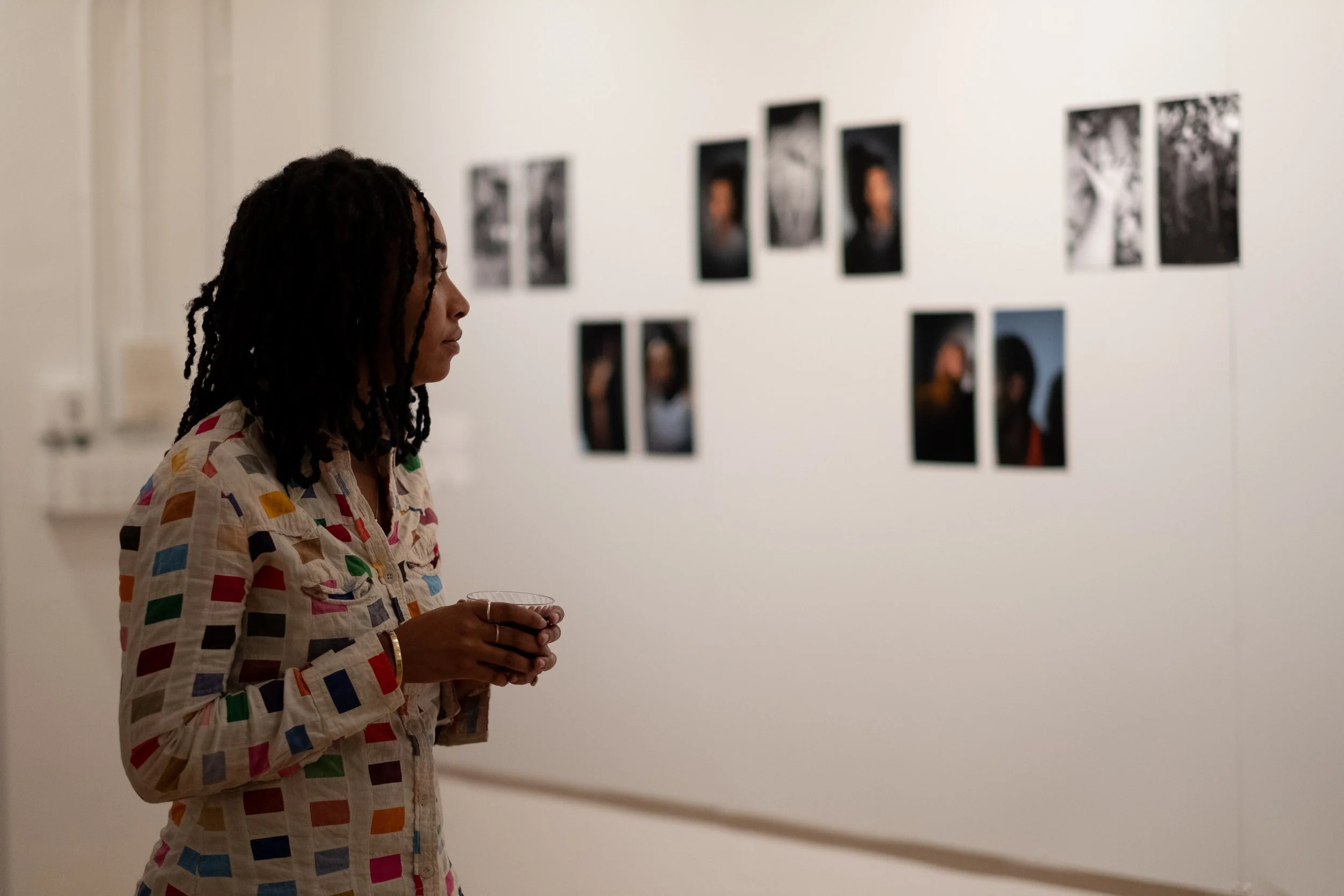  Former Mangum Foundation intern Samaira Wilson looking at the work of Abdo Shanan at the Magnum Foundation.  