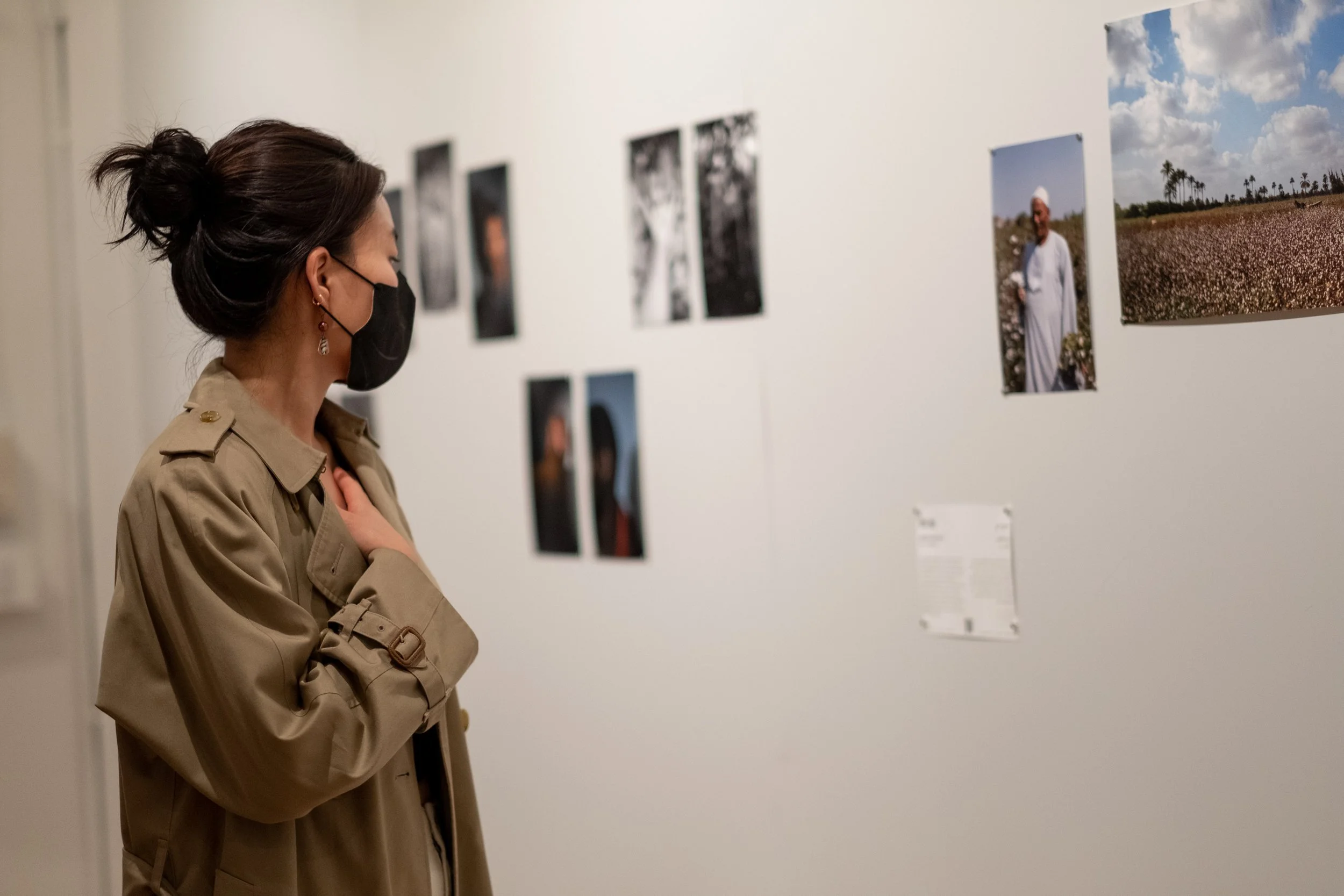  Counter Histories advisor Tricia Kim in front of the work of Abdo Shanan (left) and Amina Kadous (right) at the Magnum Foundation. 