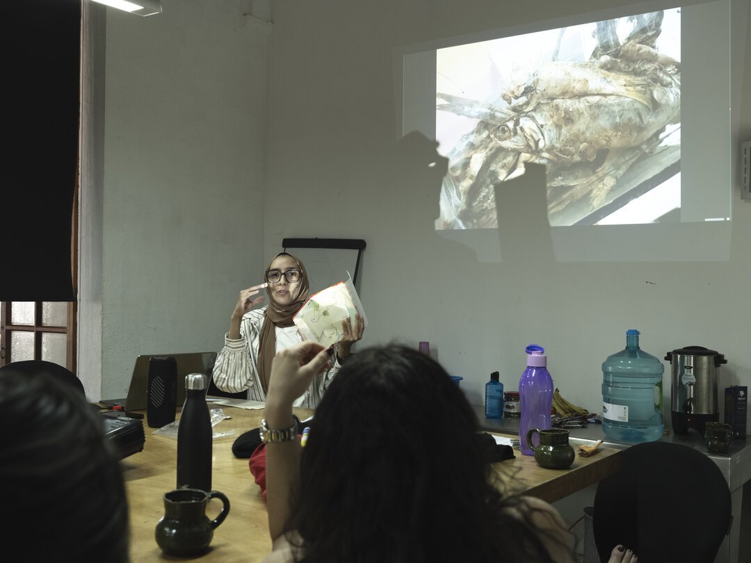 Fellow Fatma Fahmy presents her project. Photo by Isadora Romero. 