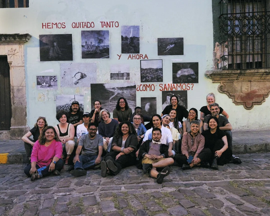  Fellows, mentors, and members of the MF team in front of their collaborative mural speaking to global climate issues at the Biblioteca de la Fundación Bustamante Vasconcelos. Photo by Tif Ng.  