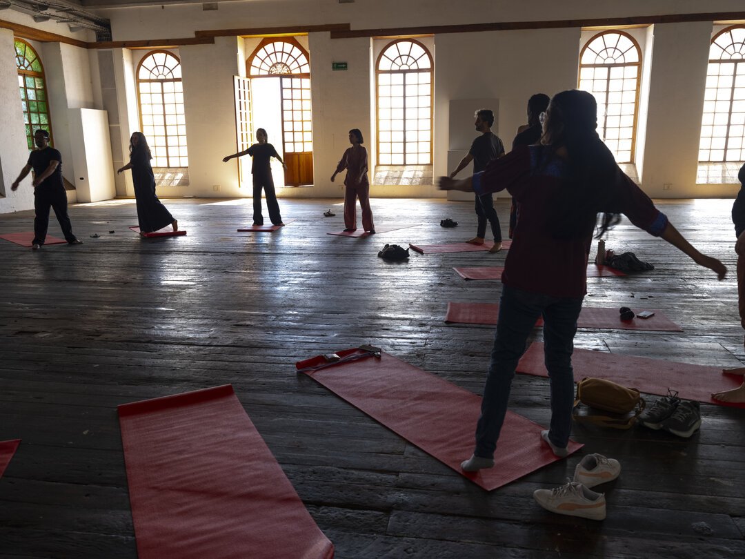  Heat Fellows participate in somatic exercises led by program mentor Nandita Raman that included reflections on belonging, vulnerability, and power. Photo by Isadora Romero.  