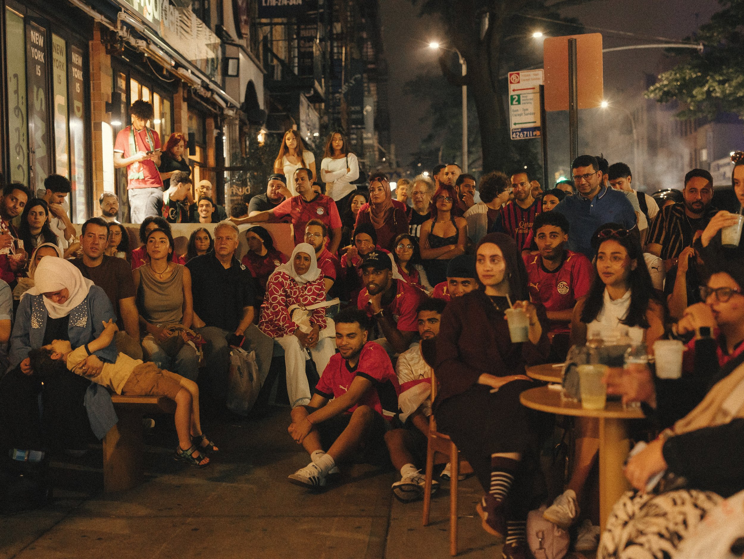  Families, children, and supporters of different generations gather together in Astoria, Queens, to watch Egypt compete in the 2026 FIFA World Cup, June 26, 2026. The gathering transforms a neighborhood space into a shared place of celebration and co
