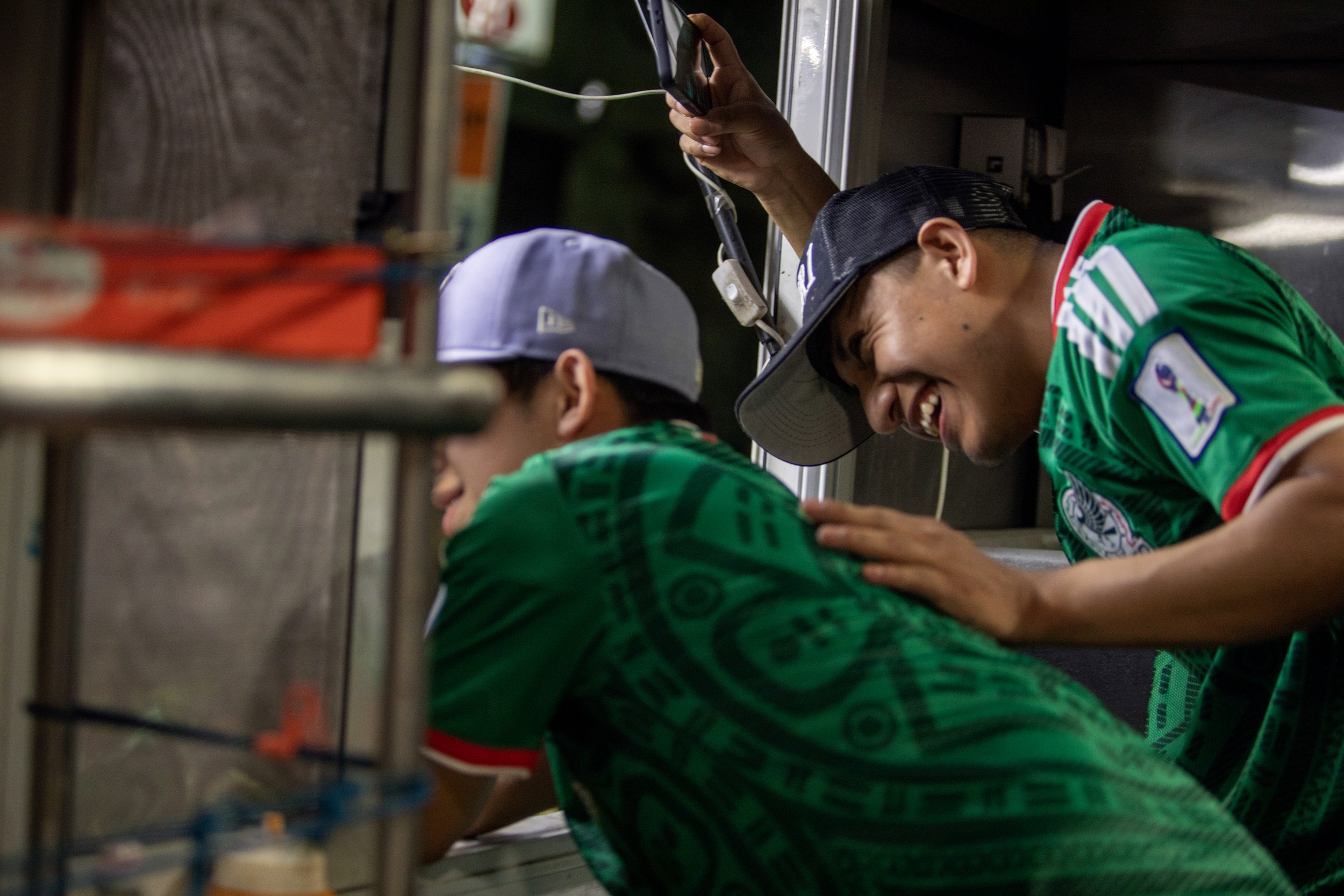 Taco truck workers celebrate Mexico's victory over Ecuador during the 2026 FIFA World Cup watch party hosted by Migo Events and POC Fútbol Brooklyn in Bushwick, Brooklyn, July 3, 2026. 