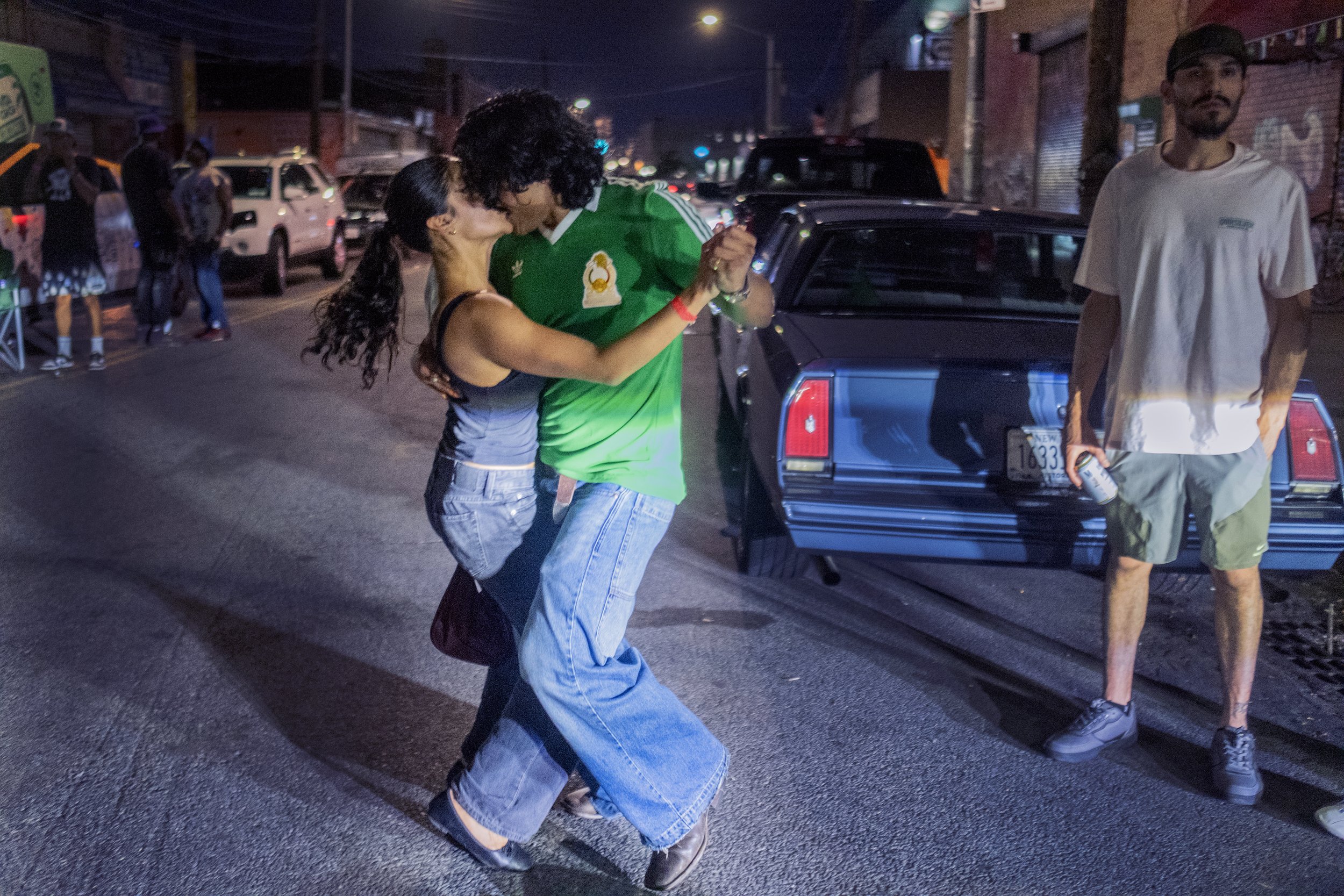  A couple dances in celebration of Mexico’s victory over Czechia during the 2026 FIFA World Cup in the streets of Bushwick, Brooklyn, on June 24, 2026. 