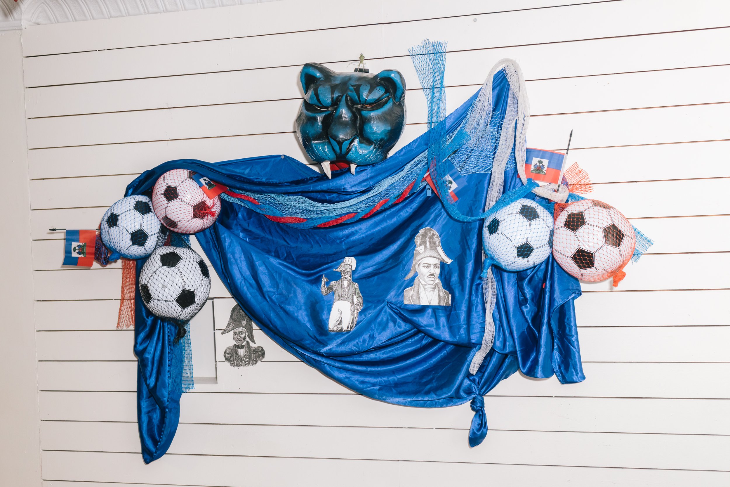  Haiti Cultural Exchange in Brooklyn redesigned their space for the World Cup for viewing parties and to promote the designs of two Haitian designers, Garvenchy Nicolas and Maison Demar. 